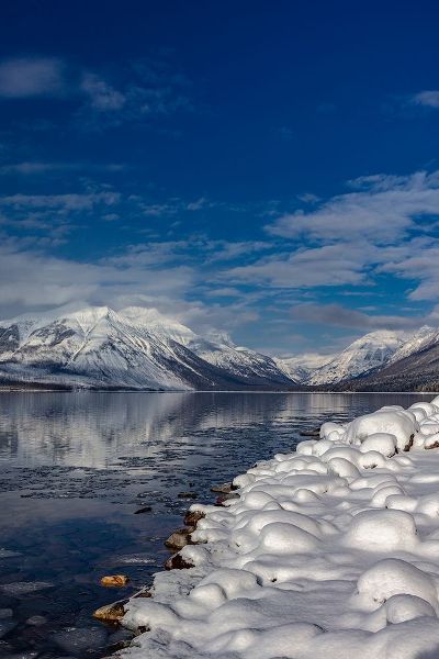 Haney, Chuck 아티스트의 Mountains reflect in wintry Lake McDonald in Glacier National Park-Montana-USA작품입니다.